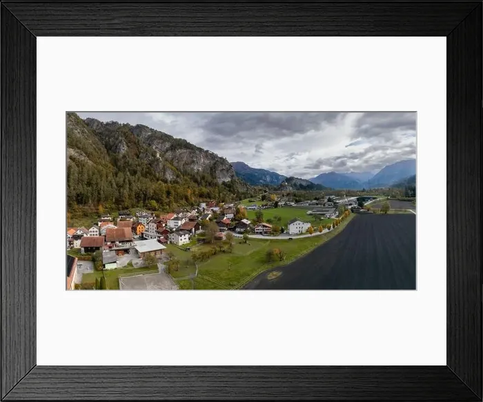 Framed Print : A panorama view of the village of Rothenbrunnen in southeastern Switzerland in autumn Framed Print : A panorama view of the village of Rothenbrunnen in southeastern Switzerland in autumn