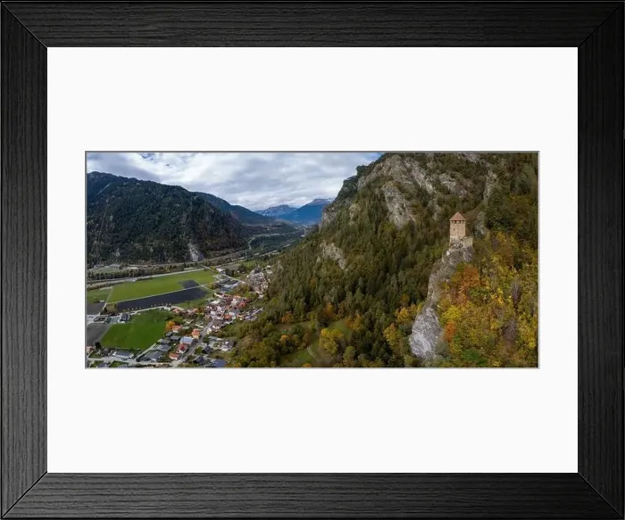 Framed Print : A view of the village of Rothenbrunnen and the Oberjuvalt fortress in autumn Framed Print : A view of the village of Rothenbrunnen and the Oberjuvalt fortress in autumn