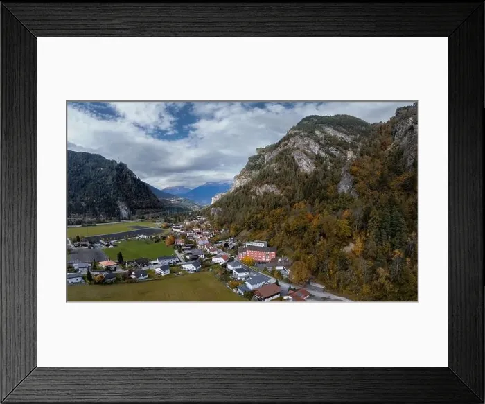 Framed Print : A view of the village of Rothenbrunnen in southeastern Switzerland in autumn Framed Print : A view of the village of Rothenbrunnen in southeastern Switzerland in autumn
