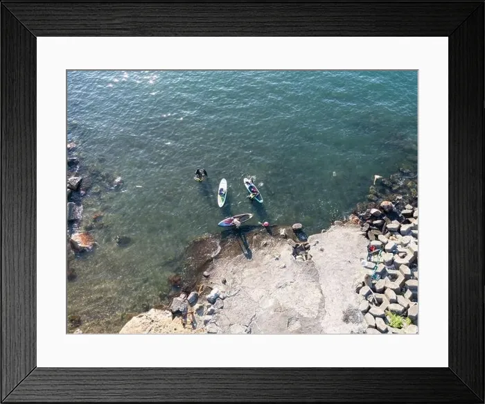Framed Print : Young people enjoying marine sports such as SUP in Keelung City, Taiwan. September 2024 Framed Print : Young people enjoying marine sports such as SUP in Keelung City, Taiwan. September 2024