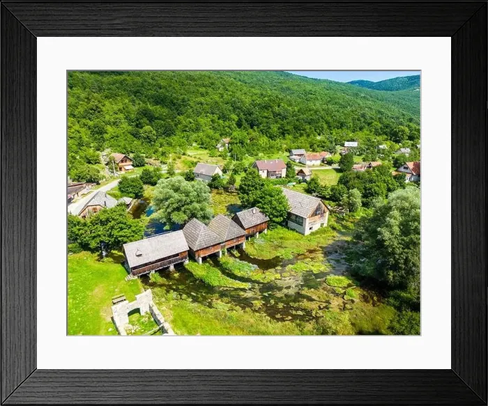 Framed Print : Aerial photo of Majerovo Vrilo, set of wooden mill houses on the source of Gacka river in the village of Sinac, Croatia Framed Print : Aerial photo of Majerovo Vrilo, set of wooden mill houses on the source of Gacka river in the village of Sinac, Croatia