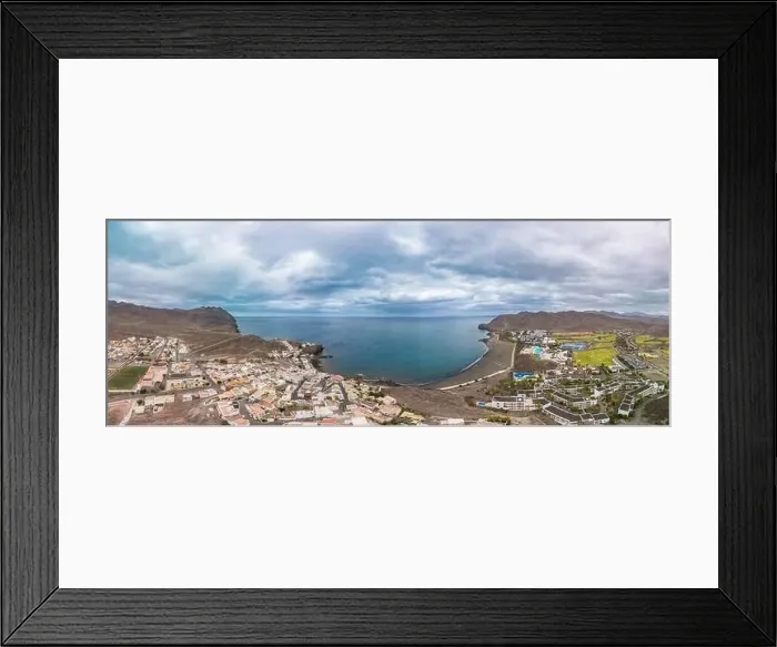 Framed Print : Aerial drone view of Las Playitas fishing town and the beach, Fuerteventura, Canary Islands, Spain Framed Print : Aerial drone view of Las Playitas fishing town and the beach, Fuerteventura, Canary Islands, Spain
