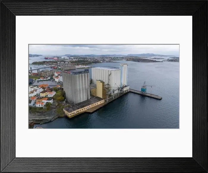 Framed Print : Aerial view of a large industrial silo complex by the waterfront Framed Print : Aerial view of a large industrial silo complex by the waterfront
