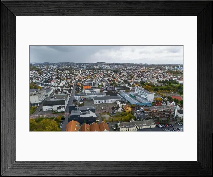 Framed Print : Aerial view of a European city with a mix of residential and commercial buildings Framed Print : Aerial view of a European city with a mix of residential and commercial buildings