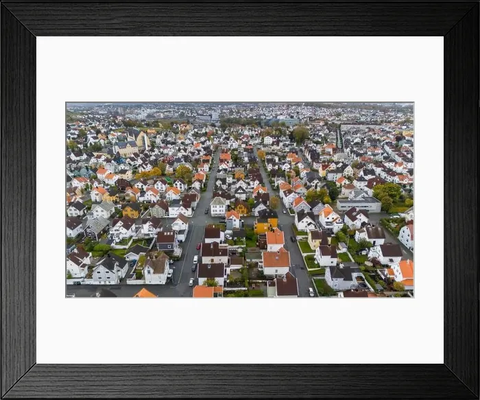 Framed Print : Aerial view of a suburban neighborhood with colorful houses and tree-lined streets Framed Print : Aerial view of a suburban neighborhood with colorful houses and tree-lined streets