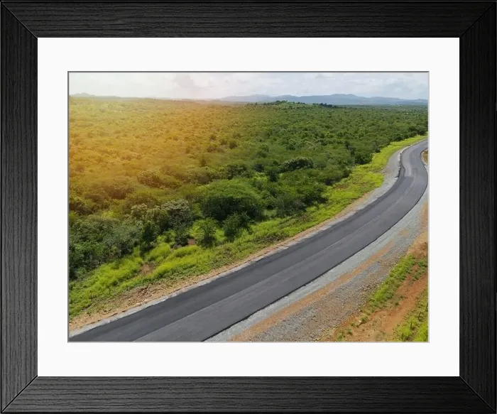 Framed Print : Curvy asphalt road in rural landscape aerial drone view Framed Print : Curvy asphalt road in rural landscape aerial drone view