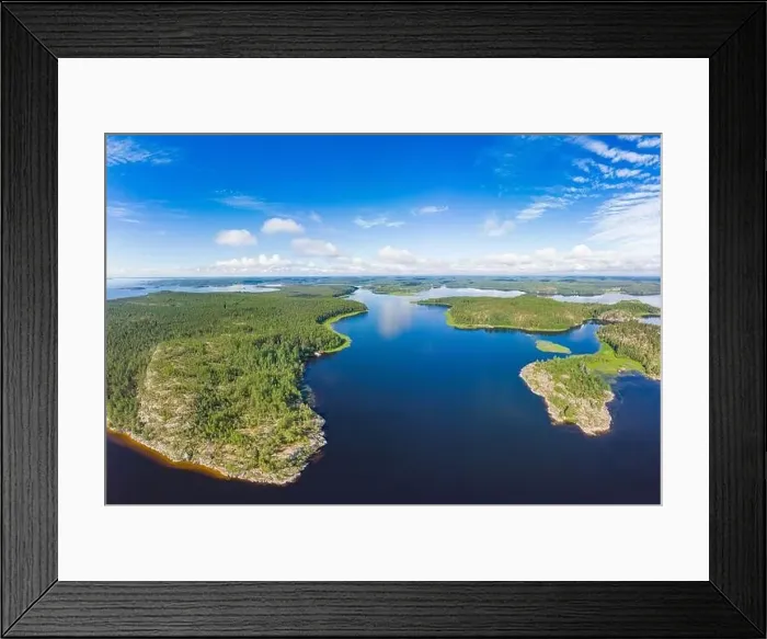 Framed Print : Aerial top view to island Kilpola overgrown with sparse trees in summer sunny day Framed Print : Aerial top view to island Kilpola overgrown with sparse trees in summer sunny day