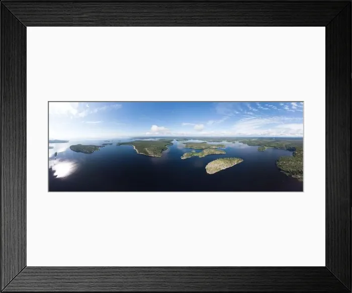 Framed Print : Aerial top view to island Kilpola overgrown with sparse trees in summer sunny day Framed Print : Aerial top view to island Kilpola overgrown with sparse trees in summer sunny day