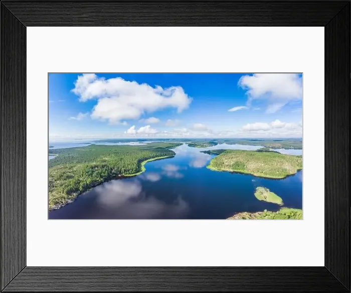 Framed Print : Aerial top view to island Kilpola overgrown with sparse trees in summer sunny day Framed Print : Aerial top view to island Kilpola overgrown with sparse trees in summer sunny day