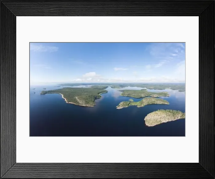 Framed Print : Aerial top view to island Kilpola overgrown with sparse trees in summer sunny day Framed Print : Aerial top view to island Kilpola overgrown with sparse trees in summer sunny day