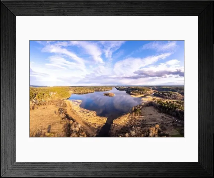 Framed Print : Aerial top view to island overgrown with sparse trees in summer sunny day Framed Print : Aerial top view to island overgrown with sparse trees in summer sunny day