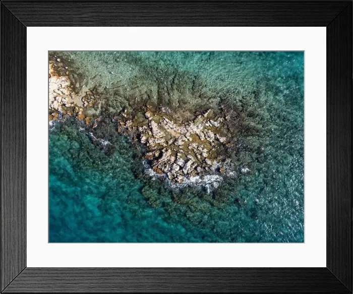 Framed Print : Reefs at the middle of the sea from the top, photo shoot from a drone in a sunny day Framed Print : Reefs at the middle of the sea from the top, photo shoot from a drone in a sunny day