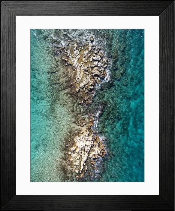 Framed Print : Reefs at the middle of the sea from the top, photo shoot from a drone in a sunny day Framed Print : Reefs at the middle of the sea from the top, photo shoot from a drone in a sunny day