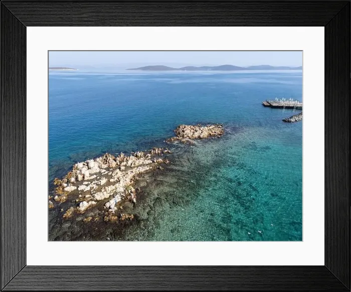 Framed Print : Reefs at the middle of the sea from the top, photo shoot from a drone in a sunny day Framed Print : Reefs at the middle of the sea from the top, photo shoot from a drone in a sunny day