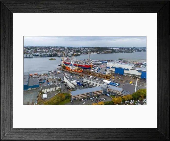 Framed Print : Aerial view of a shipyard with cranes and docked ships Framed Print : Aerial view of a shipyard with cranes and docked ships