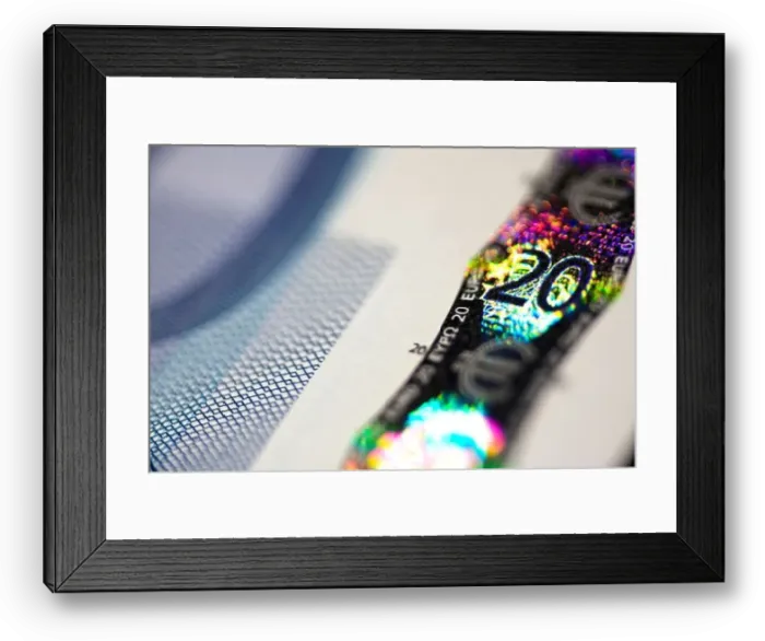 Framed Print : Close up of security hologram strip on euro bank note Framed Print : Close up of security hologram strip on euro bank note