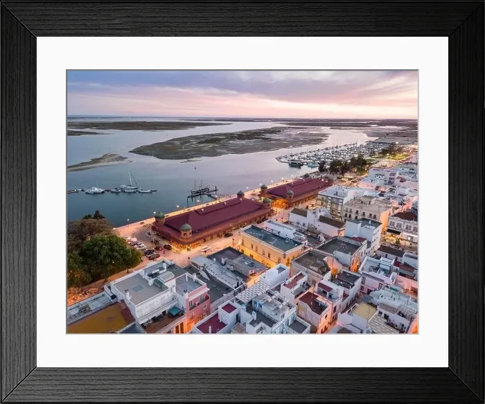 Framed Print : City view with two market buildings and and river Ria Formosa in the evening Framed Print : City view with two market buildings and and river Ria Formosa in the evening