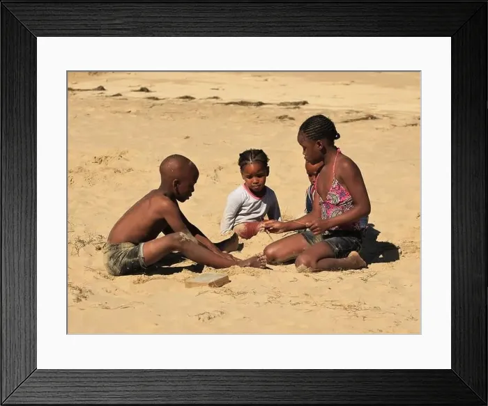 Framed Print : Cute black African kids playing on a beach Framed Print : Cute black African kids playing on a beach