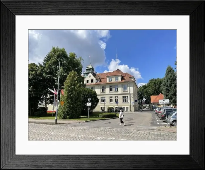 Framed Print : OLESNO, POLAND - Aug 11, 2021: The trail Station and city government office in Olesno, Poland Framed Print : OLESNO, POLAND - Aug 11, 2021: The trail Station and city government office in Olesno, Poland