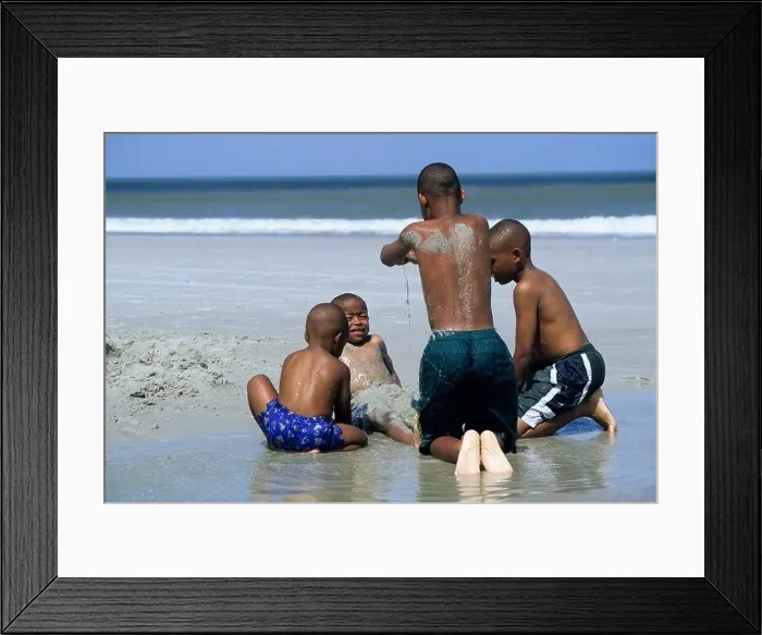 Framed Print : African American boys playing in sand at beach Jacksonville Florida Framed Print : African American boys playing in sand at beach Jacksonville Florida