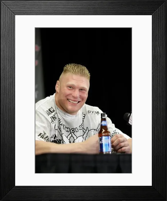 Framed Print : Brock Lesnar with a Bud Light bottle at a post-fight press conference at UFC 100 at the Mandalay Bay Events Center Framed Print : Brock Lesnar with a Bud Light bottle at a post-fight press conference at UFC 100 at the Mandalay Bay Events Center