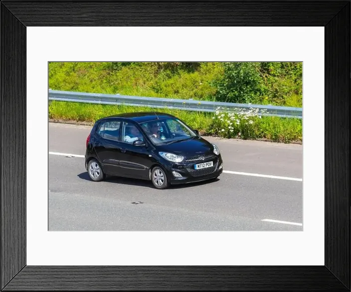 Framed Print : 2012 black Hyundai I10 Active; Vehicular traffic moving vehicles Framed Print : 2012 black Hyundai I10 Active; Vehicular traffic moving vehicles