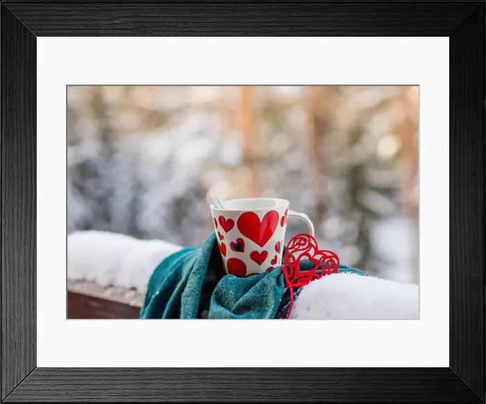 Framed Print : White cup of coffee on a snow covered balcony Framed Print : White cup of coffee on a snow covered balcony