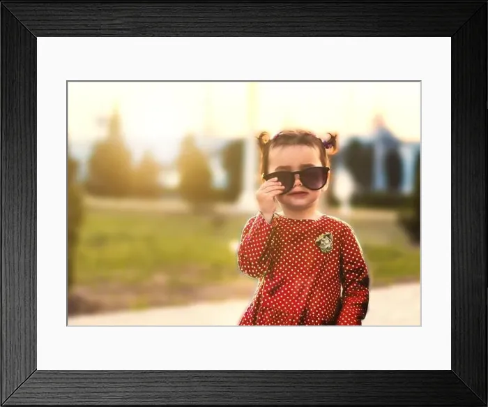 Framed Print : stylish girl in a red dress and sunglasses Framed Print : stylish girl in a red dress and sunglasses