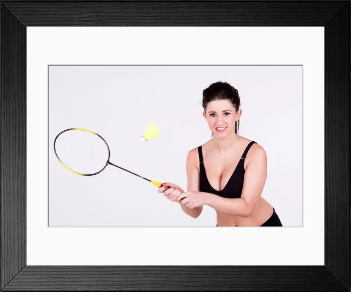 Framed Print : Young female badminton player in action Framed Print : Young female badminton player in action