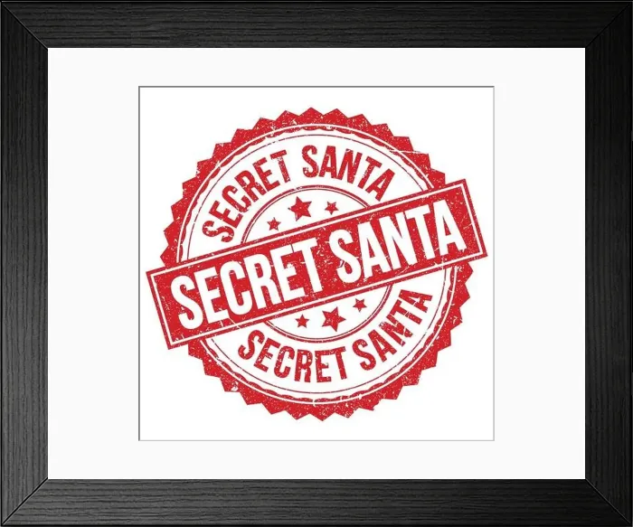 Framed Print : SECRET SANTA text written on red round stamp sign Framed Print : SECRET SANTA text written on red round stamp sign
