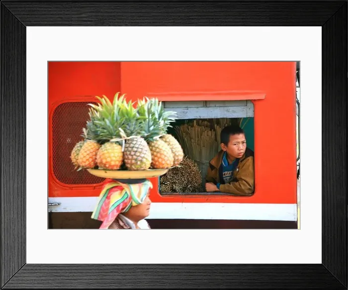 Framed Print : A woman selling fruit, a boy looking out of the window of a train, Hispaw, Shan State, Myanmar, Burma, Asia Framed Print : A woman selling fruit, a boy looking out of the window of a train, Hispaw, Shan State, Myanmar, Burma, Asia