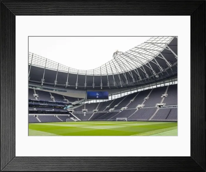 Framed Print : view of the empty pitch and stand of the Tottenham Hotspur football stadium Framed Print : view of the empty pitch and stand of the Tottenham Hotspur football stadium
