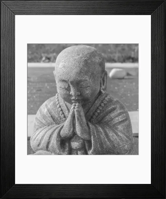 Framed Print : Stone statue of a Buddhist monk praying Framed Print : Stone statue of a Buddhist monk praying