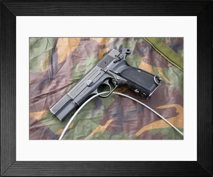 Framed Print : Browning 9mm handgun Framed Print : Browning 9mm handgun