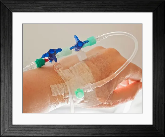 Framed Print : Human hand on IV drip in a hospital Framed Print : Human hand on IV drip in a hospital