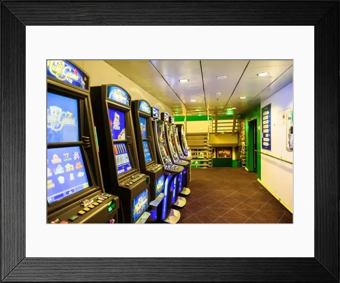 Framed Print : TALLINN / ESTONIAS - December 6 2018: Sandinavian ferry interiors. Slot machines in hall and cafe Framed Print : TALLINN / ESTONIAS - December 6 2018: Sandinavian ferry interiors. Slot machines in hall and cafe