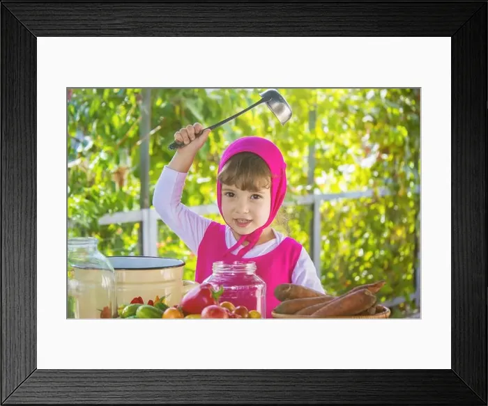 Framed Print : Child and vegetables. Selective focus Framed Print : Child and vegetables. Selective focus