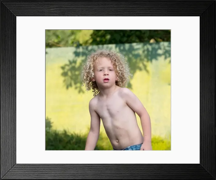 Framed Print : little boy shirtless playing in the garden Framed Print : little boy shirtless playing in the garden