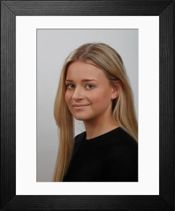 Framed Print : headshot or portrait of a young blonde woman with green eyes, wearing a black top Framed Print : headshot or portrait of a young blonde woman with green eyes, wearing a black top
