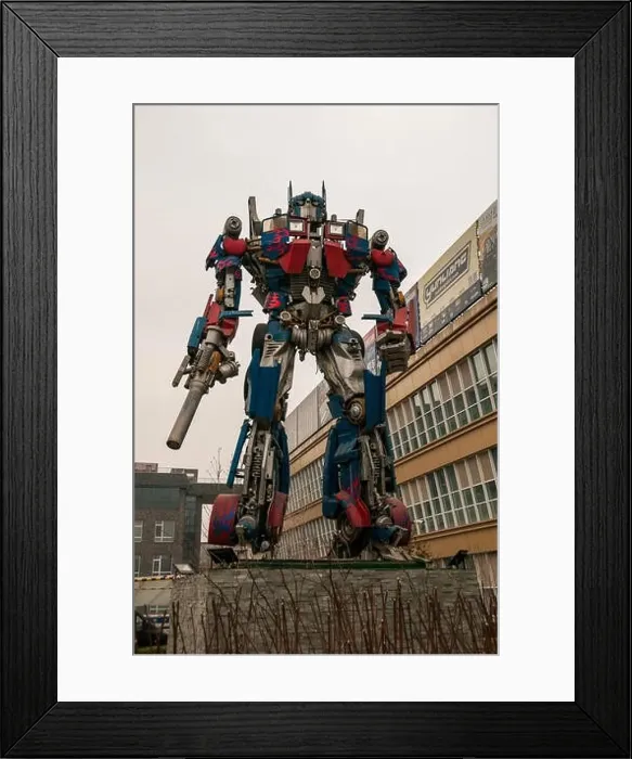 Framed Print : An Optimus Prime like Transformer made from car parts on the Beijing Tuning Street Framed Print : An Optimus Prime like Transformer made from car parts on the Beijing Tuning Street