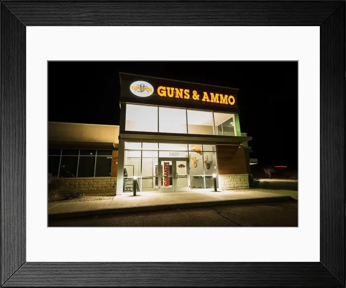 Framed Print : A large gun shop at night at a mall in Lake Havasu City, Arizona, USA Framed Print : A large gun shop at night at a mall in Lake Havasu City, Arizona, USA