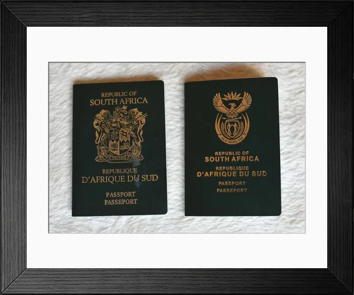 Framed Print : An example of an old South African passport next to a new South African passport Framed Print : An example of an old South African passport next to a new South African passport
