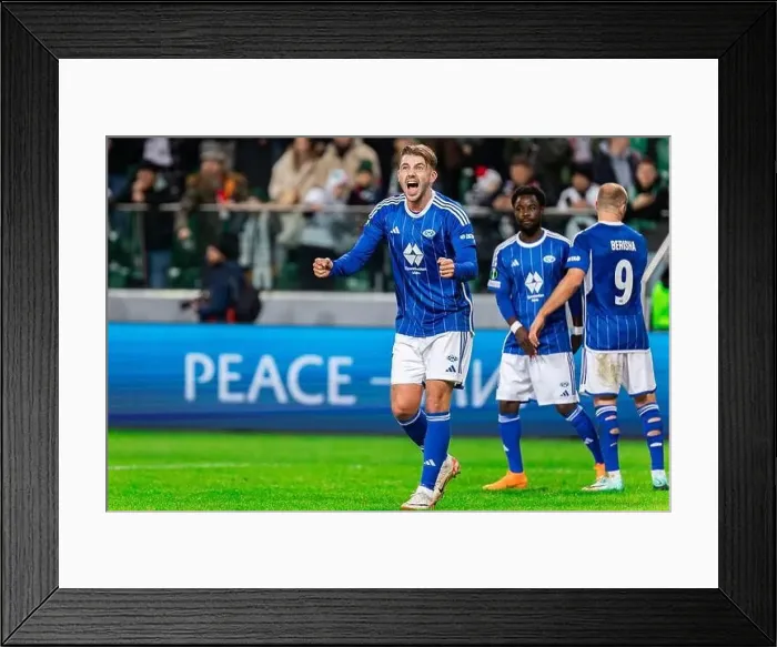 Framed Print : Niklas Odegard of Molde FK celebrates victory during the UEFA Europa Conference League knockout round play-off match Framed Print : Niklas Odegard of Molde FK celebrates victory during the UEFA Europa Conference League knockout round play-off match