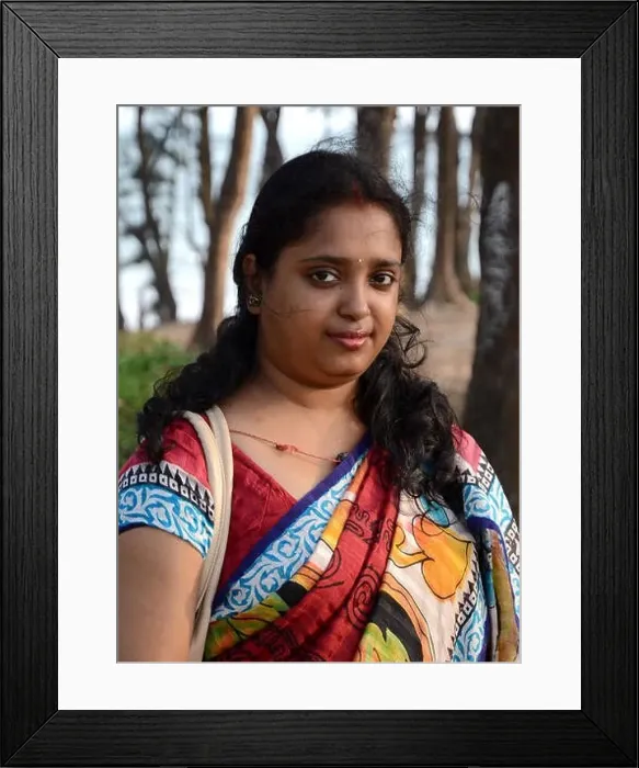 Framed Print : Indian Woman at the sea side area of Digha, West Bengal in India Framed Print : Indian Woman at the sea side area of Digha, West Bengal in India