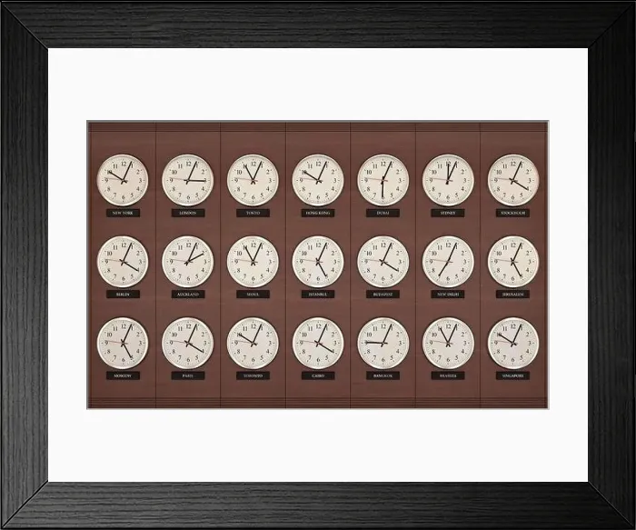 Framed Print : World wide time zone clock. Clocks on the wall, showing the time around the world Framed Print : World wide time zone clock. Clocks on the wall, showing the time around the world
