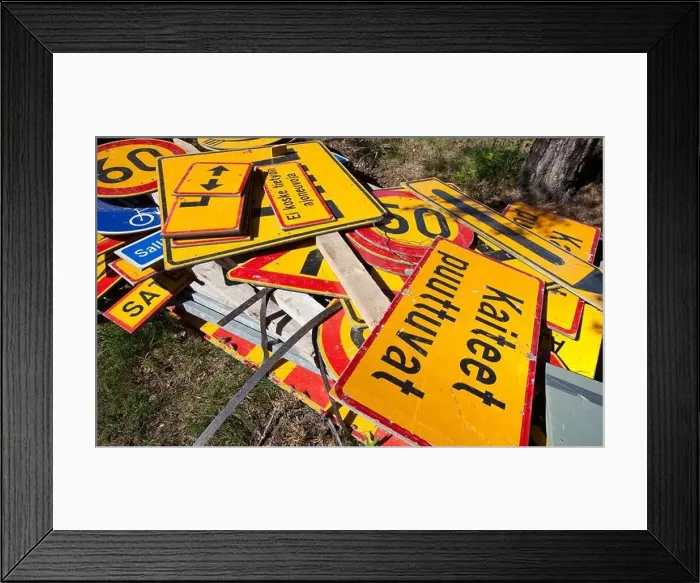 Framed Print : Messy inventory pile of Finnish traffic signs lying on the ground, Finland Framed Print : Messy inventory pile of Finnish traffic signs lying on the ground, Finland
