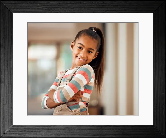 Framed Print : Happy, smile and portrait of a girl child in her home with a positive mindset standing with crossed arms Framed Print : Happy, smile and portrait of a girl child in her home with a positive mindset standing with crossed arms