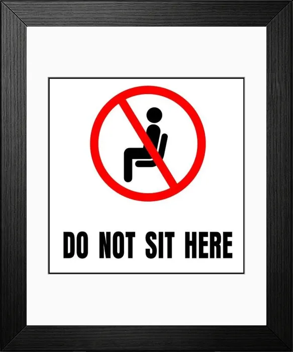 Framed Print : Do not sit here sign for public places to encourage social distancing Framed Print : Do not sit here sign for public places to encourage social distancing