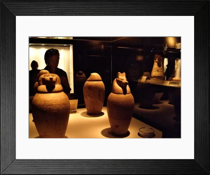 Framed Print : Visitor looking at coptic jars, Mummification Museum, Luxor, Egypt - High ISO Image Framed Print : Visitor looking at coptic jars, Mummification Museum, Luxor, Egypt - High ISO Image