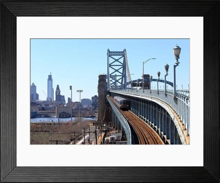 Framed Print : A Lindenwold-bound PATCO speedline train on the Benjamin Franklin Bridge with Philadelphia Framed Print : A Lindenwold-bound PATCO speedline train on the Benjamin Franklin Bridge with Philadelphia